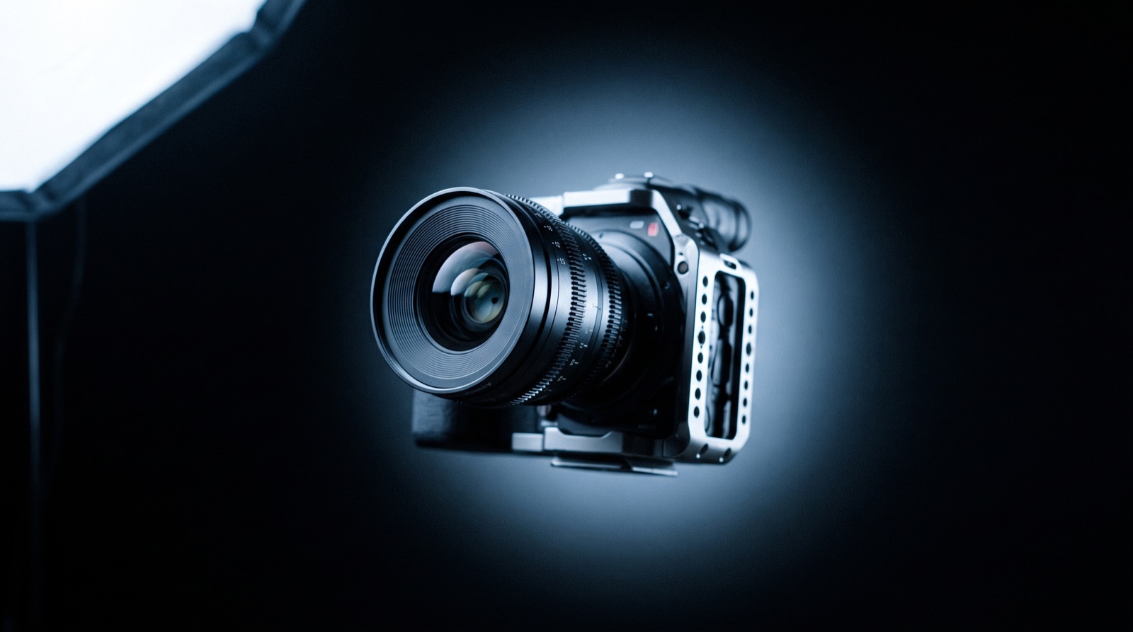 Cinema camera with prime lens in studio light.